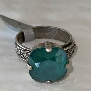 NWT- aqua, marine, crystal stone, inlaid in a stamped silver adjustable ring.